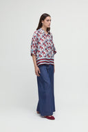 Camicia over a maniche corte