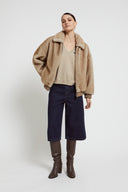 Giubbotto teddy con zip e colletto morbido