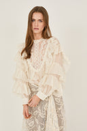 Blusa in chiffon con ruches e pizzo