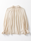Blusa fluida con fiocco al collo