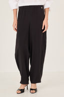 Pantalone fluido in raso stretch